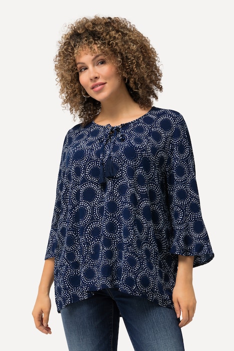 Blouse à motif cercles et col rond, ligne A et manches 3/4. Tissu crêpe