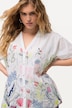 Chemisier oversize avec broderies. Décolleté V et manches courtes