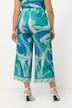Jupe-culotte large, ceinture élastique. Jambe large descendant jusqu'au mollet.