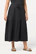 Jupe en jersey texturé. Coupe évasée et volant. Taille élastique