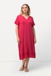 Robe midi en jersey, avec col tunisien et manches courtes. Silhouette en A évasée.