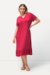 Robe midi en jersey, avec col tunisien et manches courtes. Silhouette en A évasée.