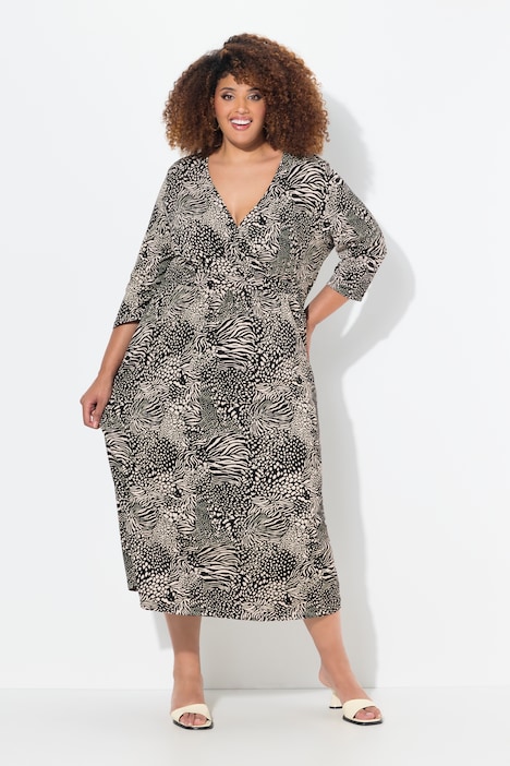 Robe maxi en jersey, décolleté en V et manches 3/4. Coupe évasée. Motif animal.