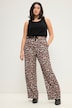 Pantalon taille haute à jambes larges et taille partiellement élastique. Imprimé léopard