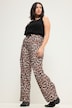 Pantalon taille haute à jambes larges et taille partiellement élastique. Imprimé léopard