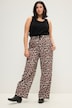 Pantalon taille haute à jambes larges et taille partiellement élastique. Imprimé léopard