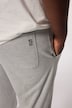 Pantalon en molleton STHUGE, coupe Tapered Loose Fit avec taille élastique - jusqu'au 8 XL