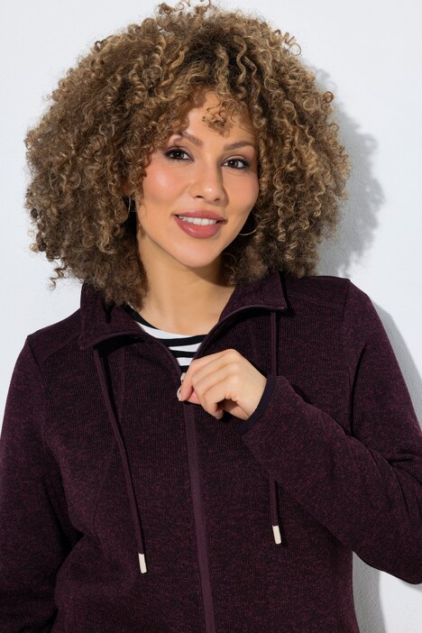 Veste en maille polaire, motif chiné, col montant et poches zippées