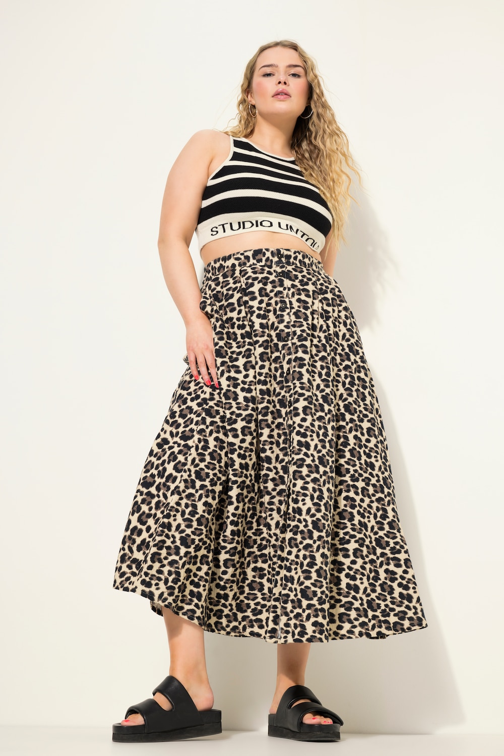 Nederdel, A-form, musselin. Leopard-print, delvist elastisk linning