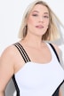 Maillot de bain esprit « colour block ». Bretelle triple et bonnets souples. Matières recyclées