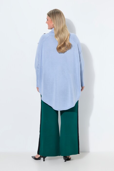 Pull oversize esprit poncho, base en pointe et maille avec motif torsadé