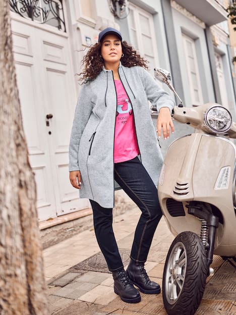 Jas van gebreide fleece, opstaande kraag, langer model, ritszakken