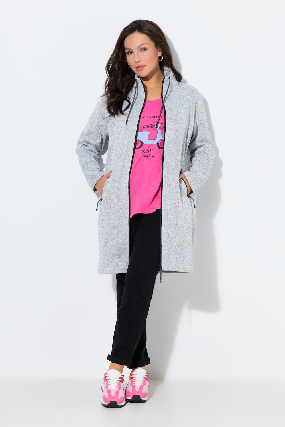 Jas van gebreide fleece, opstaande kraag, langer model, ritszakken