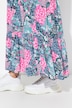 Jupe midi à volants. Motif floral. Taille élastique. Coupe évasée
