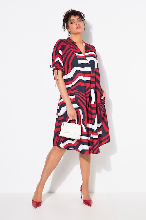 Robe oversize, décolleté en V, manches courtes et poches