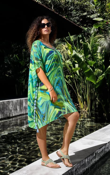 Tunique en mousseline, coupe oversize, décolleté en V et manches courtes, joli motif vagues