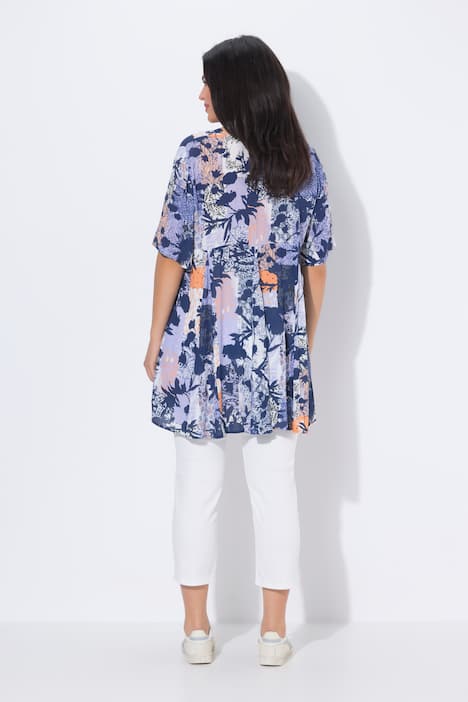 Blouse, motif animaux de la jungle. Décolleté carré et manches courtes. Coupe évasée