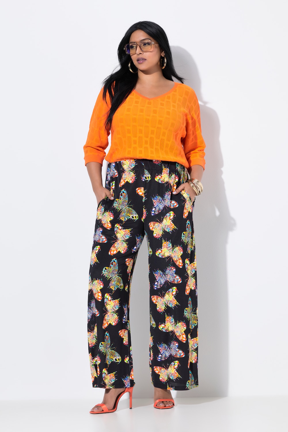Slinky broek, vlinders, wijde pijpen, elastische tailleband