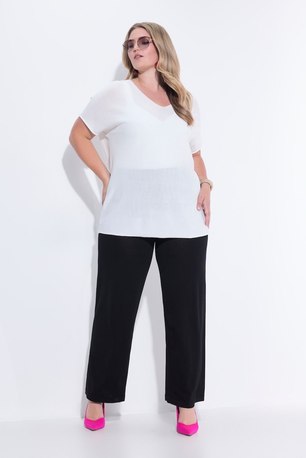 Gebreide broek, wijde lange pijp, elastische tailleband