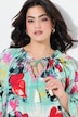 Tunika-bluse, blomstret Comic-print, 3/4-lange ærmer