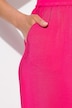 Jupe-culotte à jambe large et taille élastique. Tissu à texture irrégulière