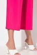 Jupe-culotte à jambe large et taille élastique. Tissu à texture irrégulière