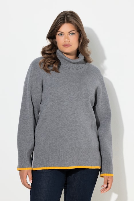 Pull en maille. Col roulé et manches longues