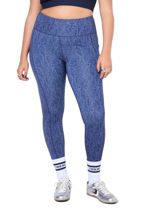 Sportovní kalhoty, vysoký pas, hadí potisk, ke kotníkům, postranní kapsy