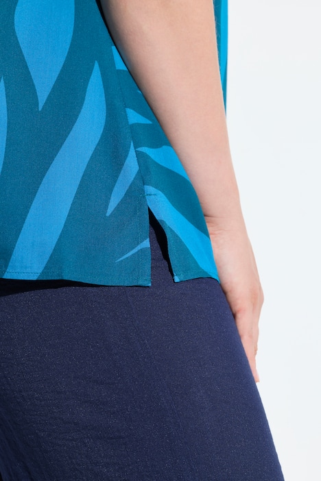 Tunica dal taglio oversize con limette, scollo a V e mezze maniche