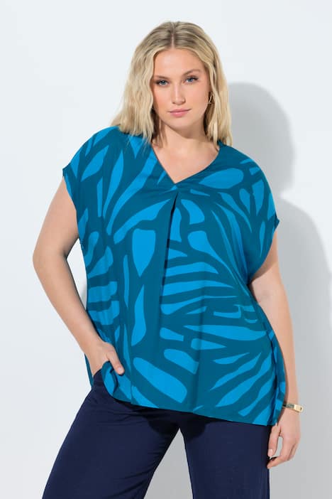 Tunica dal taglio oversize con limette, scollo a V e mezze maniche