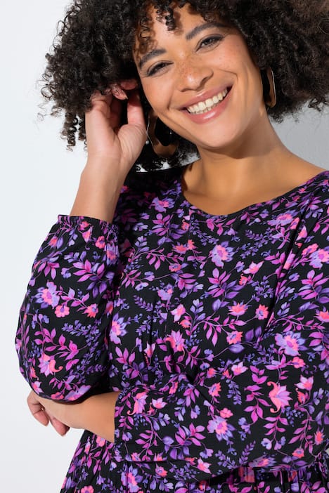 Robe midi coupe évasée, volant, manches longues et motif à fleurs