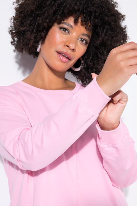 Sweat-shirt avec découpe à la base et coutures fantaisie, coupe Loose Fit