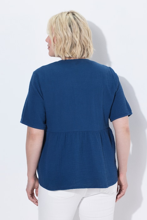 Blusa de muselina, cierre con lazo, escote en V, media manga