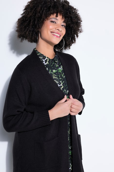 Vest, lang en recht, open model, geribbeld breisel