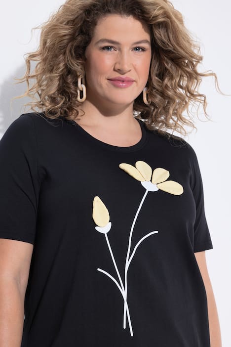 T-shirt in cotone biologico con fiori, scollo a girocollo e mezze maniche