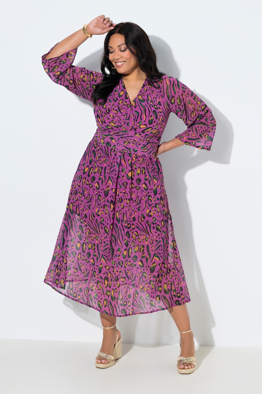 Jerseykleid, Leomuster, V-Ausschnitt, Trompeten-Langarm