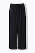 Pantalon, fentes à l’ourlet, jambe large et ceinture élastique