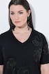 T-shirt med dekorative perler og V-hals