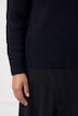 Maglione in maglia fine con collo alto e maniche lunghe