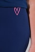 Cycliste, coupe près du corps, broderie en forme de cœur