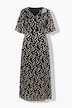 Robe longue en tissu dévoré, décolleté en V et manches en cloche