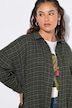 Ternet musselinbluse, oversized, lange ærmer