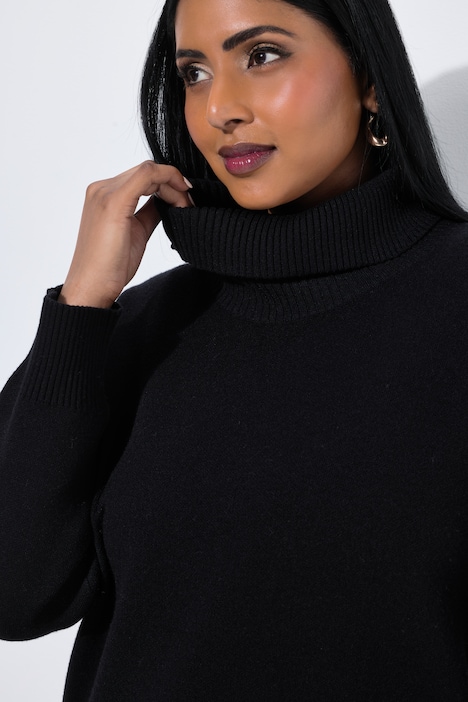 Pull avec large bordure en dentelle, col roulé en maille côtelée et manches longues