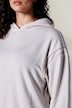 Sweat-shirt à capuche, matière douce et confortable, bordures fantaisie