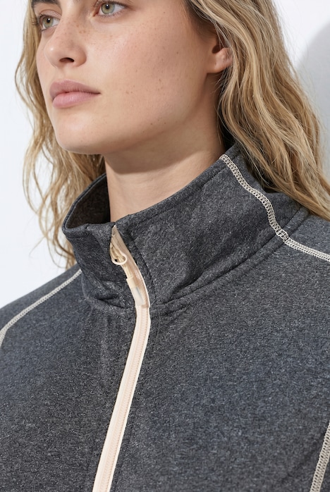 Veste en molleton, coutures fantaisie, col montant et manches longues avec passe-pouces