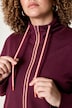Veste en molleton avec passepoil, coupe confortable, col montant et poche kangourou