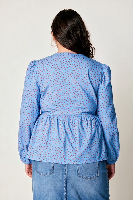 Blouse coupe confortable, se ferme à l’aide de petits rubans, manches gigot
